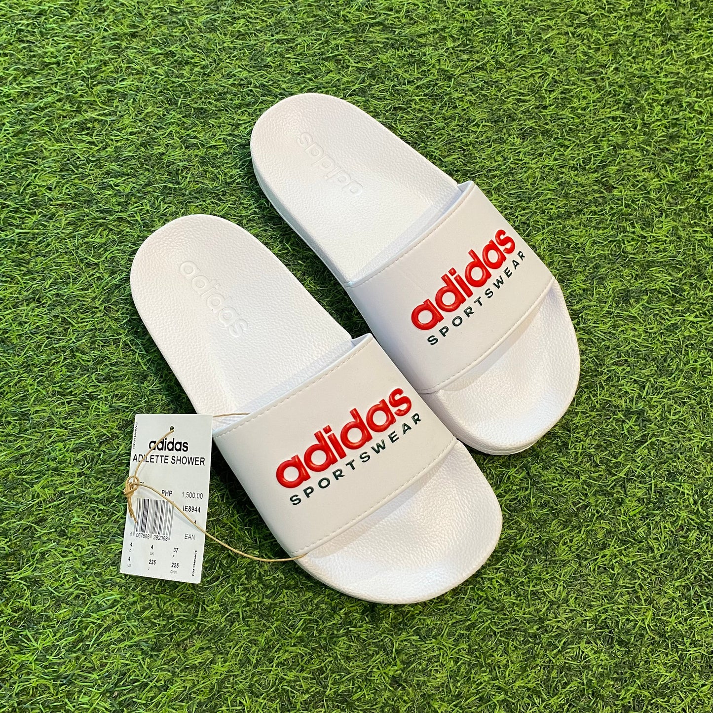 ADILETTE SHOWER “Cloud white Scarlet”